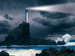 A lighthouse in the middle of a stormy ocean.